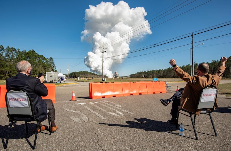 Acting Nasa administrator Steve Jurczyk (L) and Rick Gilbrech, director of Nasa's Stennis Space Center watch a second test of the core stage of a Boeing-built rocket for Artemis missions that aim to return US astronauts to the moon by 2024, at NASA’s Stennis Space Center near Bay St. Louis, Mississippi, March 18, 2021. Nasa/Reuters