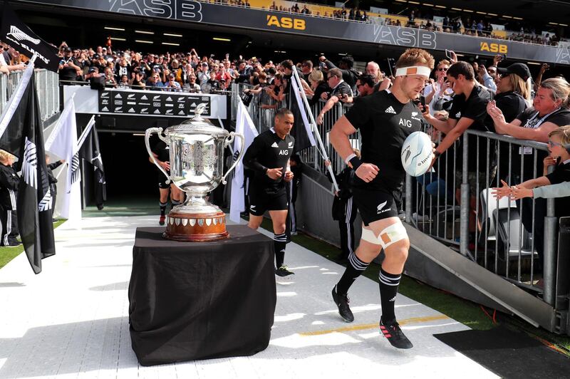 New Zealand captain Sam Cane leads his team onto the pitch for the second Bledisloe Cup match against Australia in Auckland. AFP