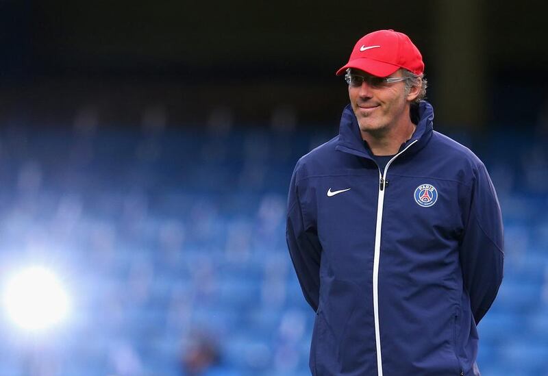 PSG manager Laurent Blanc looks on during a training session at Stamford Bridge on Monday, April 7, 2014 in London, England. His team meets Chelsea in a Uefa Champions League quarterfinal, second-leg match on Tuesday. Julian Finney/Getty Images