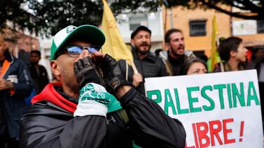 Pro-Palestine protesters gather outside the Palestinian embassy in Bogota, Colombia. EPA