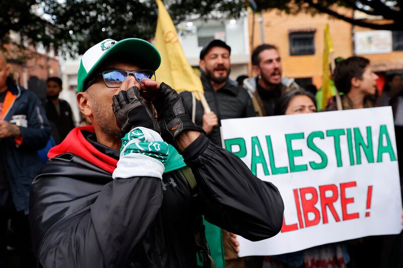 Several people demonstrate in support of Palestine at the Palestinian Embassy in Bogota, Colombia. EPA