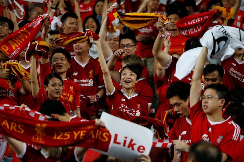 Liverpool fans show their support from the stands. Bobby Yip / Reuters