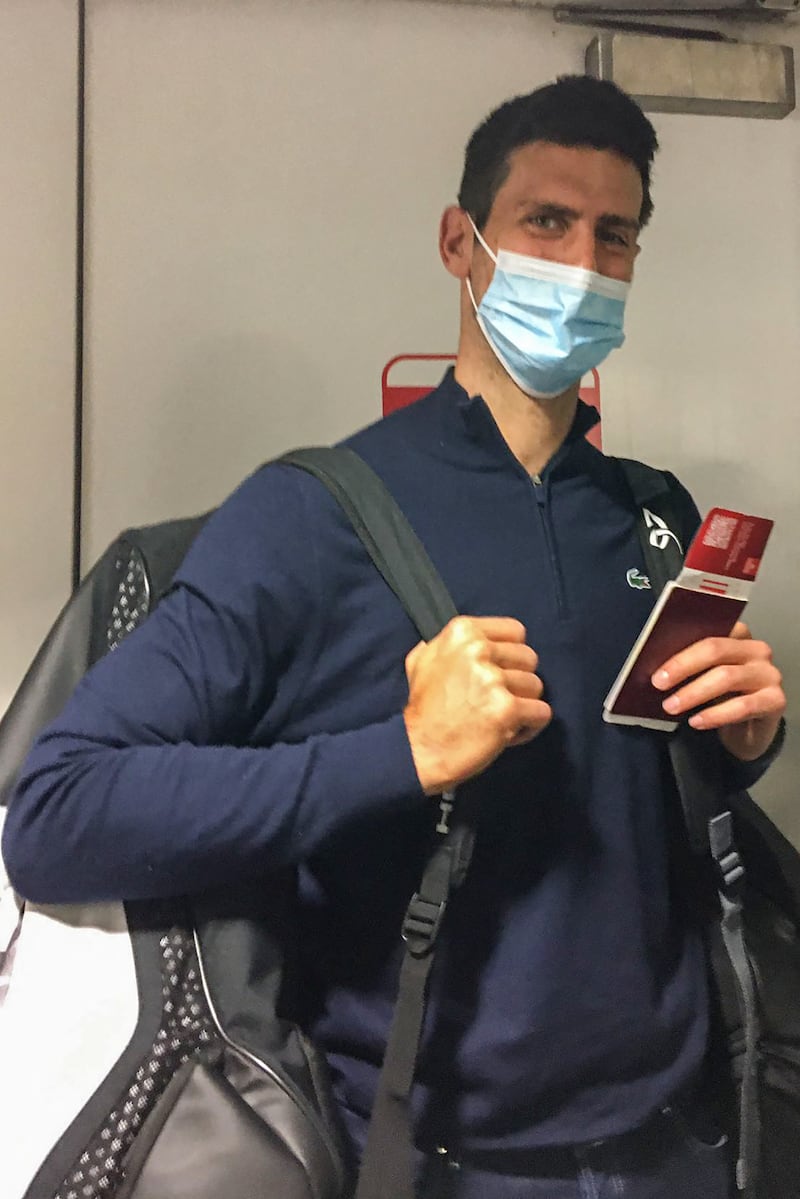 Serbia's tennis champion Novak Djokovic disembarks from a plane at the airport in Dubai. AFP