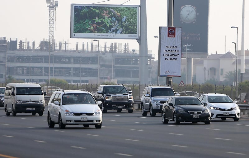 
DUBAI , UNITED ARAB EMIRATES – July 1 , 2015 : New camera radars installed to catch tailgaters on Sheikh Zayed Road in Dubai. Traffic on SZR in Dubai. ( Pawan Singh / The National ) For News. 
 *** Local Caption ***  PS0107- TAILGATING13.jpg