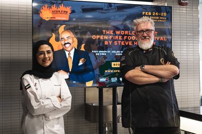 Emirati chef Aysha AlObeidli and UAE Barbecue Champion Fred Casagrande. Photo: Open Fire Food Festival