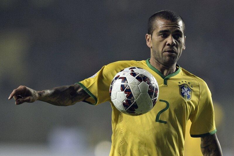 3) Dani Alves - 118 caps and eight goals. AFP