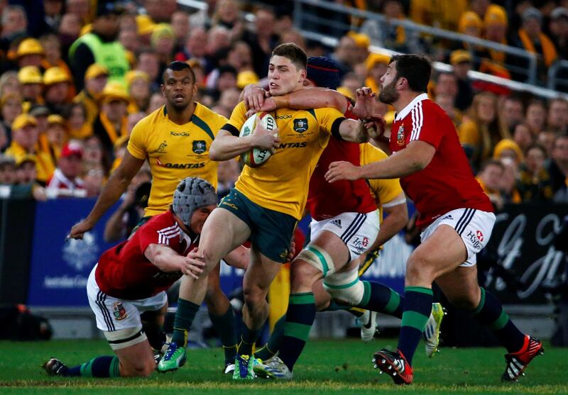 FILE PHOTO: Australia Wallabies' James O'Connor (C) is tackled by British and Irish Lions' Jonathan Davies (L) and Sean O'Brien (2nd R) during their third and final rugby union test match at ANZ stadium in Sydney, July 6, 2013.    REUTERS/David Gray/File Photo