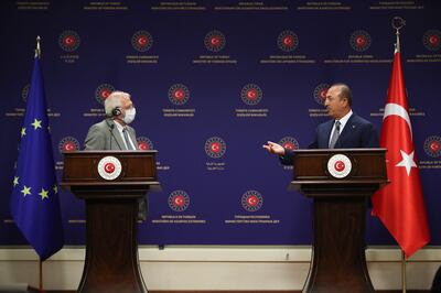 epa08531224 A handout photo made available by Turkish Foreign Ministry Press Office shows High representative of European Union Josep Borrell (L) and Turkish Minister of Foreign Affairs Mevlut Cavusoglu (R) attend their press conference in Ankara, Turkey, 06 July 2020. Borrell is visiting Turkey amid increasing tensions between the two sides most recently over the conflict in Libya.  EPA/FATIH AKTAS /  Turkish Foreign Ministry Press Office HANDOUT  HANDOUT EDITORIAL USE ONLY/NO SALES