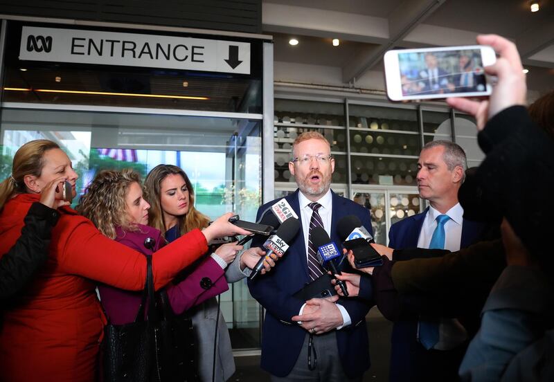 epa07626485 Editorial Director of the ABC Craig McMurtie (C) speaks to members of the media outside the ABC building located at Ultimo in Sydney, New South Wales, Australia, 05 June 2019. Federal police officers have raided ABC's Sydney offices over a series of stories published in 2017, known as 'The Afghan Files', that suggested Australian troops may have committed war crimes.  EPA/DAVID GRAY AUSTRALIA AND NEW ZEALAND OUT