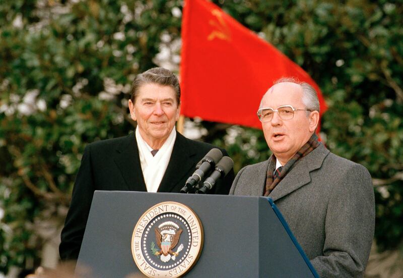 Gorbachev and Reagan speak to the press in Washington on December 8, 1987. AP