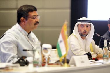 Dharmendra Pradhan, India's Minister of Petroleum & Natural Gas and Suhail Al Mazroui, the UAE's minister of energy, speaking at a roundtable during the World Energy Congress in Abu Dhabi on Tuesday. Pawan Singh / The National