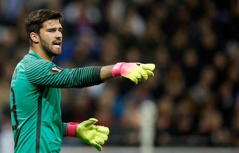 epa06898121 (FILE) AS Roma's goalkeeper Alisson Becker reacts during the UEFA Europa League Round of 16 soccer match between Olympique Lyon and AS Roma in Lyon, France, 09 March 2017 (reissued 19 July 2018). According to media reports Liverpool FC sign Alisson Becker.  EPA/GUILLAUME HORCAJUELO *** Local Caption *** 53378895