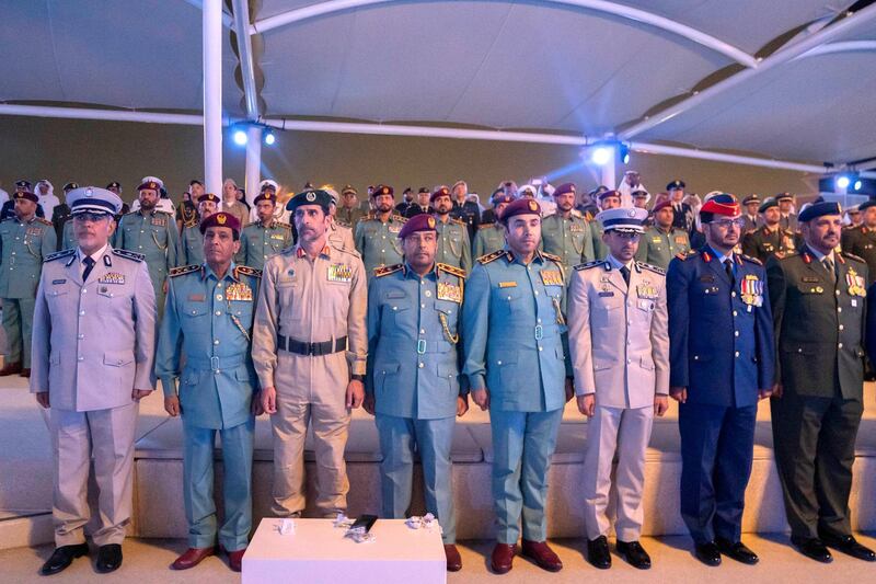 ABU DHABI, UNITED ARAB EMIRATES - November 30, 2019: HE Staff Brigadier Pilot Ali Mohamed bin Musleh Al Ahbabi, Director of the Office of the Deputy Supreme Commander of the UAE Armed Forces (2nd R), HH Sheikh Mohammed bin Tahnoon Al Nahyan, Director General of the Security and Ports Affairs at Abu Dhabi Police (3rd R) and members of the UAE Armed Forces attend a Commemoration Day ceremony at Wahat Al Karama.

( Eissa Al Hammadi for Ministry of Presidential Affairs )
---