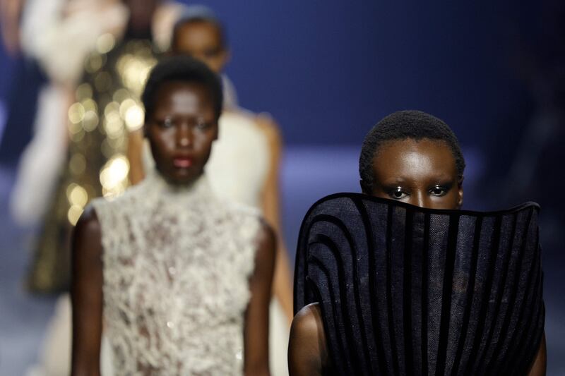 Models present creations by Ashi Studio during the Women's Haute-Couture Fall/Winter 2023/2024 Fashion Week at the Jean-Jacques Henner museum in Paris on July 6, 2023.  (Photo by Geoffroy VAN DER HASSELT  /  AFP)