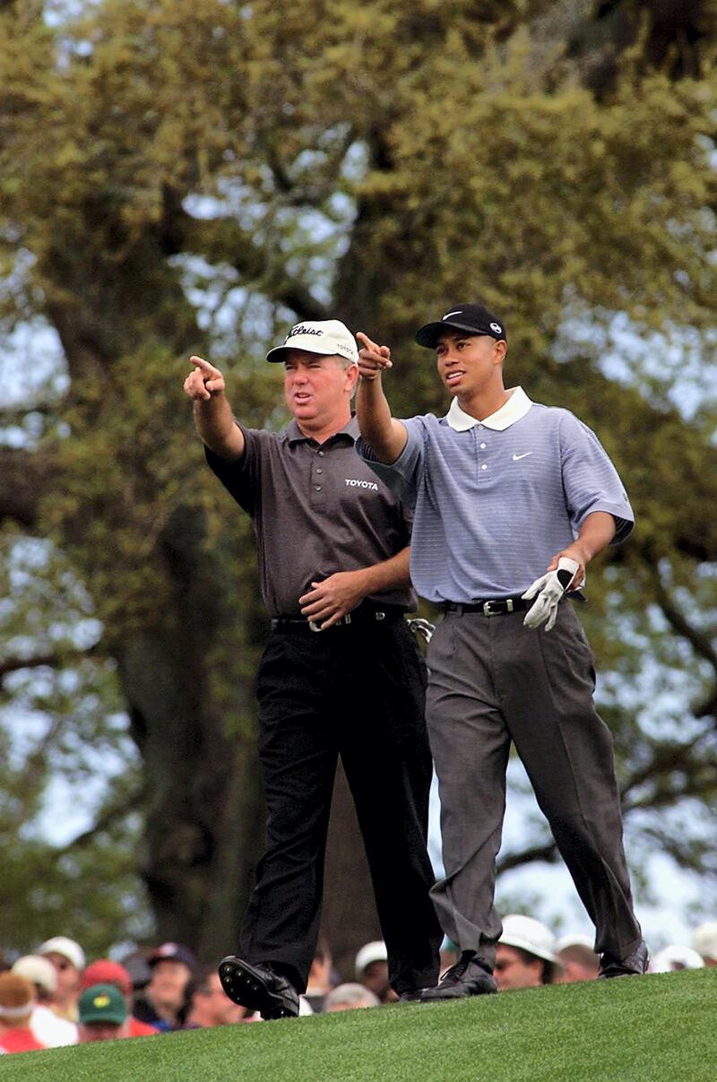 Tiger Woods (R) of the US walks with fellow countryman Mark O'Meara during their practice round, 02 April 2001, at the Augusta National Golf Club in Augusta GA. The Masters tournament will begin 05 April.  AFP PHOTO/Timothy A. CLARY (Photo by TIMOTHY A. CLARY / AFP)