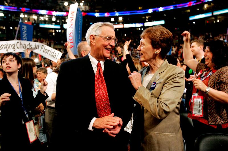 Mondale smiles with his wife, Joan, in the Minnesota delegation during the Democratic National Convention in Boston. AP