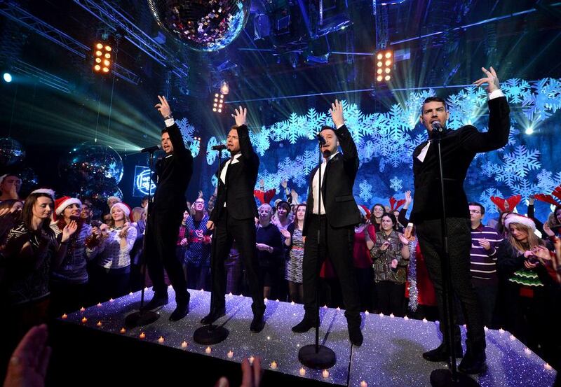 Boyzone perform for BBC1's Christmas Day Special Top of the Pops in December. Mark Allan / Invision / AP Photo