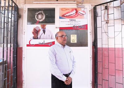 DUBAI, UNITED ARAB EMIRATES. 21 AUGUST 2019. 

Dr Sanjay Paithankar outside his clinic, Right Health New Sanaiya Clinic. Dr Sanjay came to the UAE more than 30 years ago. He worked with the health ministry before he began setting up affordable health clinics for garment workers in Ajman in the 1990s. His clinics now treat more than 500,000 and are usually located near workers’ residences. He was among those who have received the gold card visa.

(Photo: Reem Mohammed/The National)

Reporter:
Section: