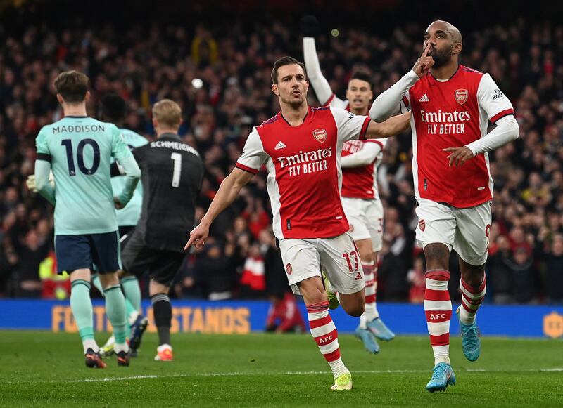 Lacazette celebrates scoring. AFP