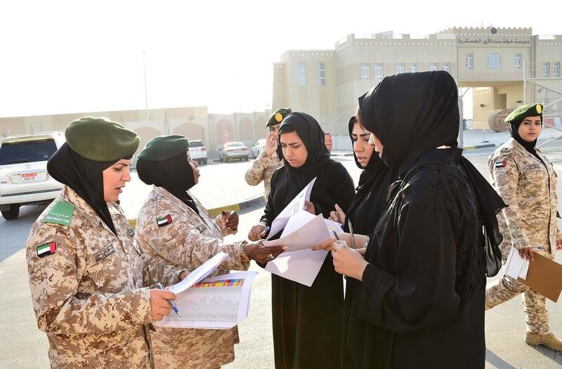 Recruits arrive for national service training. WAM