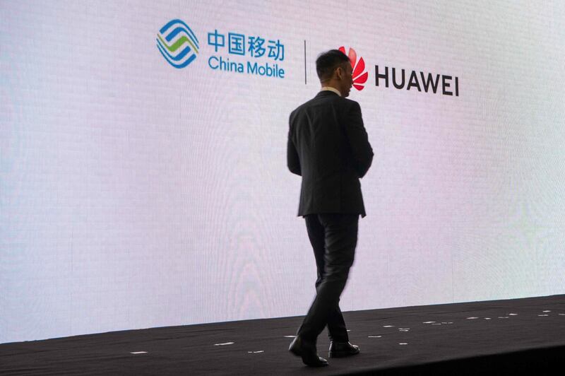 David Wang, executive director of the board, ICT Strategy & Marketing President speaks to journalists and guests at the Huawei database and storage product launch during a press conference at the Huawei Beijing Executive Briefing Centre in  Beijing.  AFP