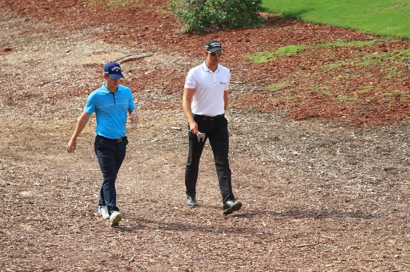 DUBAI, UNITED ARAB EMIRATES - NOVEMBER 16:  Chris Paisley of England and Henrik Stenson of Sweden walk on the 13th hole during day two of the DP World Tour Championship at Jumeirah Golf Estates on November 16, 2018 in Dubai, United Arab Emirates.  (Photo by Andrew Redington/Getty Images)