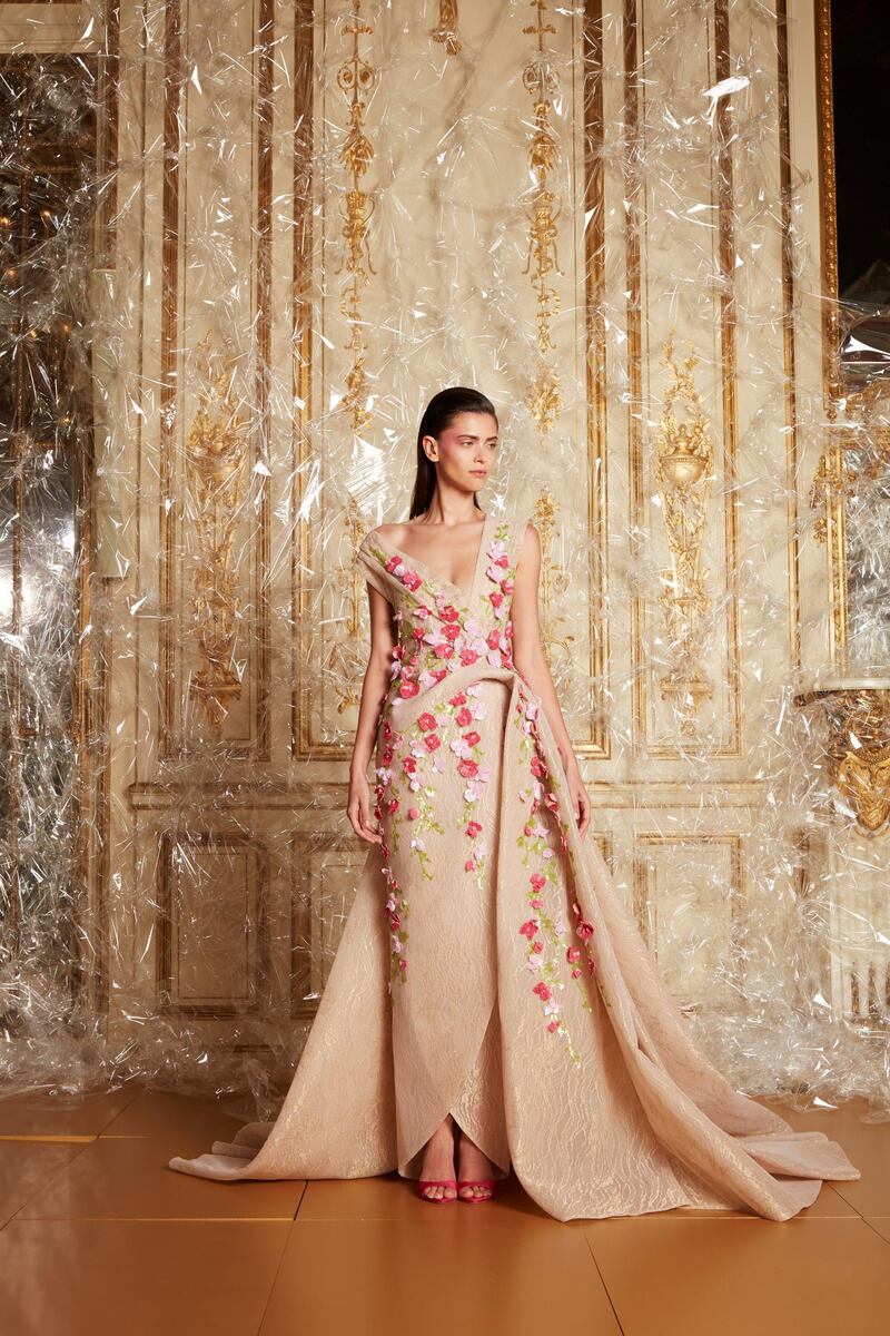 A couture gown covered in hand-cut silk petals