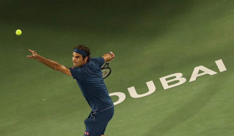 Federer unleashes a serve. AFP