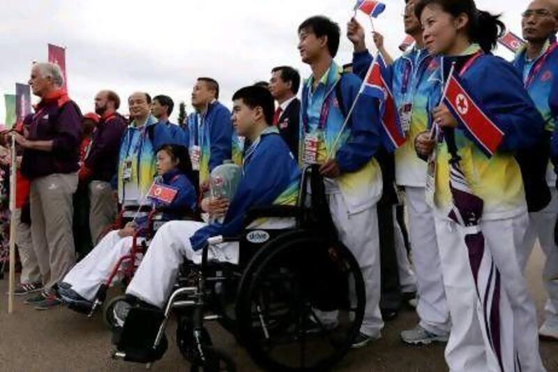 Rim Ju-song lost an arm and leg during a construction accident. Alastair Grant / AP Photo