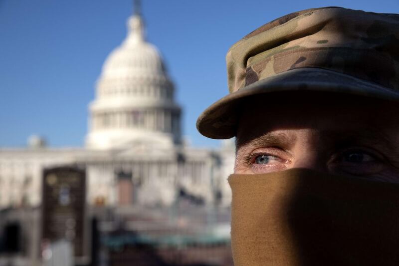 A member of the National Guard stands outside the east side of the US Capitol on January 7, 2021, in Washington. Getty Images/AFP