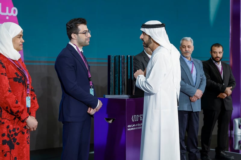 Sheikh Hamdan bin Mohammed, Crown Prince of Dubai, speaks with Mr Shahoud after he was announced as the winner. Photo: Wam