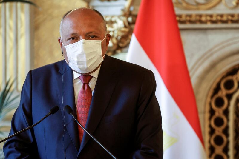 Egypt's Minister of Foreign Affairs Sameh Shoukry, wearing a protective face mask, attends a joint press conference following a meeting on the Middle East Peace process, in Paris. Reuters