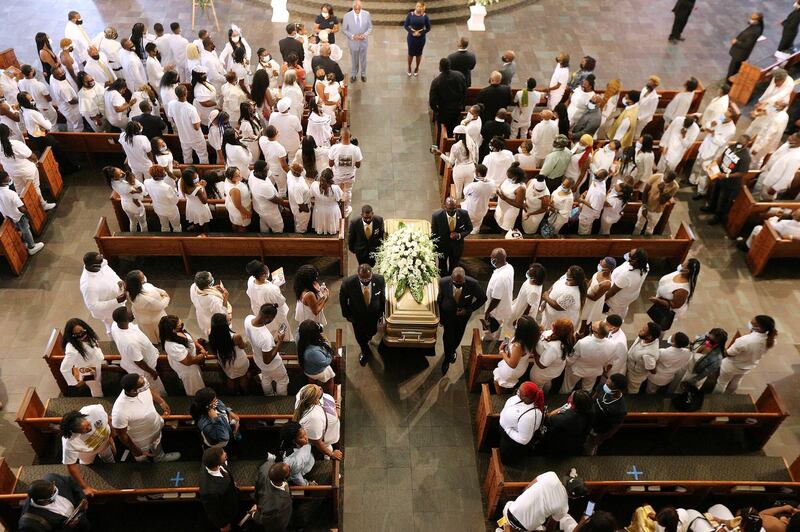 The coffin of Rayshard Brooks, who was shot dead on June 12 by an Atlanta police officer, is carried for his funeral at Ebenezer Baptist Church in Atlanta, Georgia. Reuters