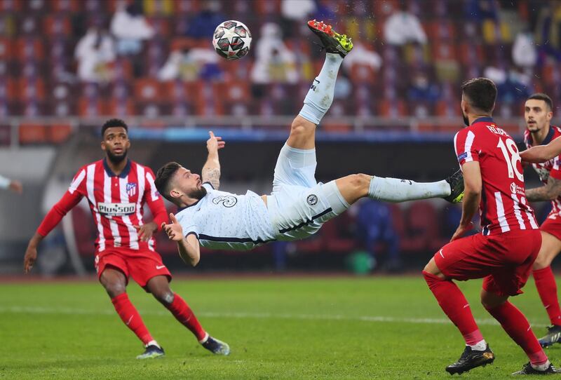 Soccer Football - Champions League - Round of 16 First Leg - Atletico Madrid v Chelsea - Arena Nationala, Bucharest, Romania - February 23, 2021 Chelsea's Olivier Giroud scores their first goal Inquam Photos via REUTERS/Stefan Constantin ROMANIA OUT. NO COMMERCIAL OR EDITORIAL SALES IN ROMANIA.. THIS IMAGE HAS BEEN SUPPLIED BY A THIRD PARTY. IT IS DISTRIBUTED, EXACTLY AS RECEIVED BY REUTERS, AS A SERVICE TO CLIENTS.