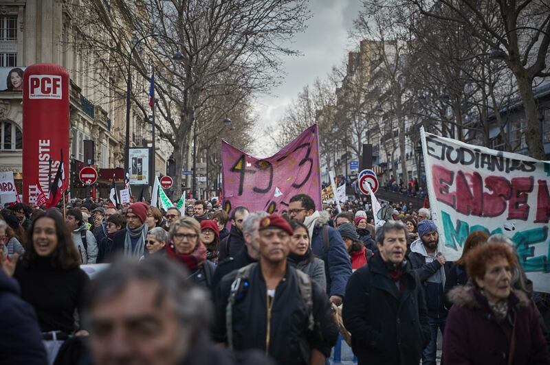 PARIS, FRANCE - MARCH 03: Demonstrations in Paris against the French Government's pension reform bill after French Unions called for a day of National Strikes in response to French Prime Minister Edouard Philippe enacting article 49.3 of the constitution to force through the pension reform bill in the National Assembly on March 03, 2020 in Paris, France. The bill merges 42 different pension schemes into a single, points-based system, to have everyone in France retire at the same time, and is largely opposed by French Unions and follows months of strikes and protests. (Photo by Kiran Ridley/Getty Images)