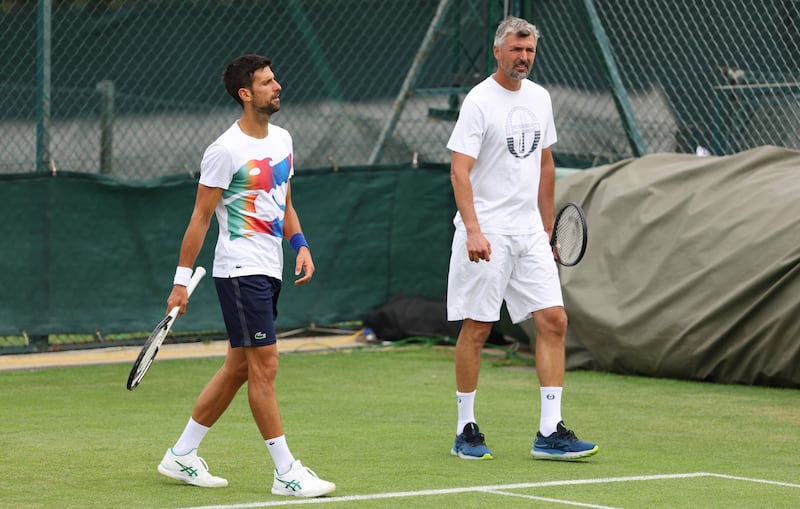 Novak Djokovic with coach Goran Ivanisevic during a training session at the All England Lawn Tennis and Croquet Club. Getty