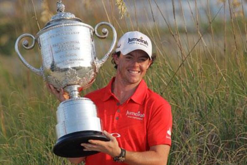 Rory McIlroy poses with the US PGA Championship trophy after his win at Kiawah Island.