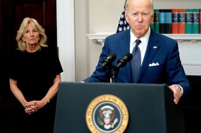US first lady Jill Biden stands beside US President Joe Biden after a gunman shot dead 19 young children at a primary school in Texas.  AFP