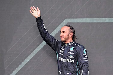 Third placed British Formula One driver Lewis Hamilton of Mercedes-AMG Petronas celebrates on the podium after the Formula One Grand Prix of Britain at the Silverstone Circuit, Silverstone, Britain, 03 July 2022.   EPA / CHRISTIAN BRUNA