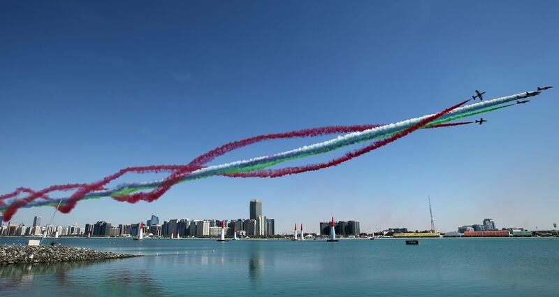 The Al Fursan  National Aerobatic Team perform a fly-by over the Corniche. AFP