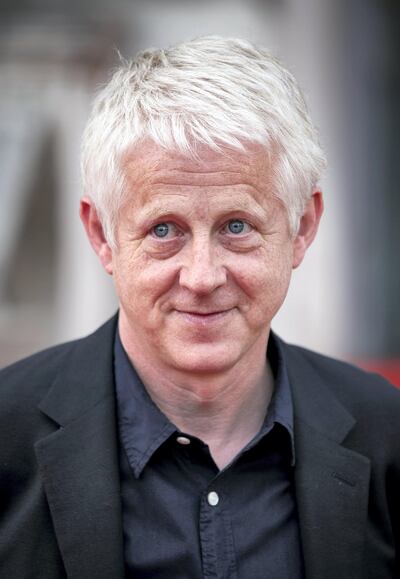 LONDON, UNITED KINGDOM - AUGUST 08: Richard Curtis attends the world premiere of 'About Time' at Somerset House on August 8, 2013 in London, England. (Photo by John Phillips/UK Press via Getty Images)