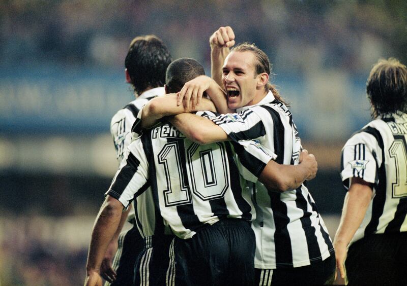 NEWCASTLE, UNITED KINGDOM - OCTOBER 20:  Newcastle defender Darren Peacock celebrates with goalscorer Les Ferdinand after the striker had scored the third Newcastle goal during the 5-0 Premier League defeat of Manchester United at St James' Park on October 20, 1996 in Newcastle Upon Tyne, England.  (Photo by Ben Radford/Allsport/Getty Images)