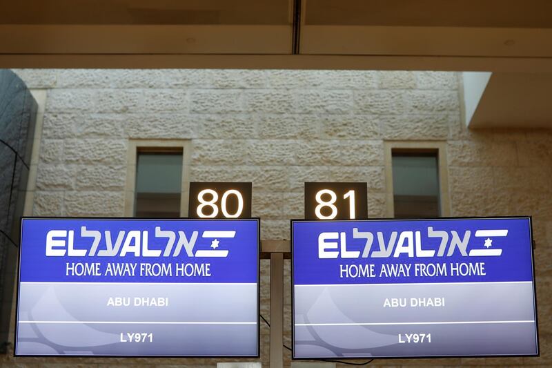 Screens displaying flight number LY971 to Abu Dhabi at Tel Aviv airport. Reuters