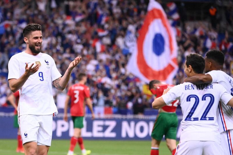 Olivier Giroud (L) celebrates with Wissam Ben Yedder (C) and Thomas Lemar after scoring a for France against Bulgaria. AFP