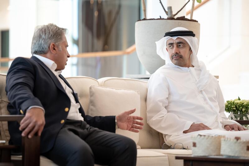 Sheikh Abdullah bin Zayed, Minister of Foreign Affairs and International Co-operation, receives a guest accompanying King Abdullah, at Al Bateen Airport.
