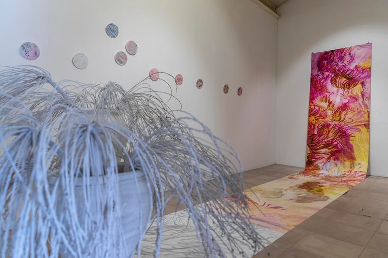 'Coral Corral' by Kim Robertson is an installation that flows from wall to floor.