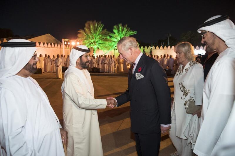 Sheikh Tahnoon bin Mohamed, Ruler’s Representative of the Eastern Region of Abu Dhabi, centre left, greets Britain’s Prince Charles, the Prince of Wales, during the launch of the UK-UAE Year of Culture at Al Jahili Fort in Al Ain. Seen here with Sheikh Mohammed bin Zayed, right, and Sheikh Saif bin Mohammed, left. Ryan Carter / Crown Prince Court — Abu Dhabi