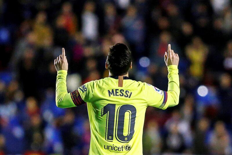 Lionel Messi celebrates after making it 3-0. EPA