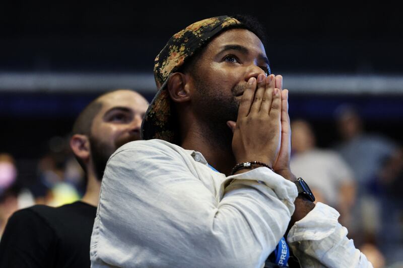 A fan reacts after Serena Williams wins her first round match against Montenegro's Danka Kovinic. Reuters