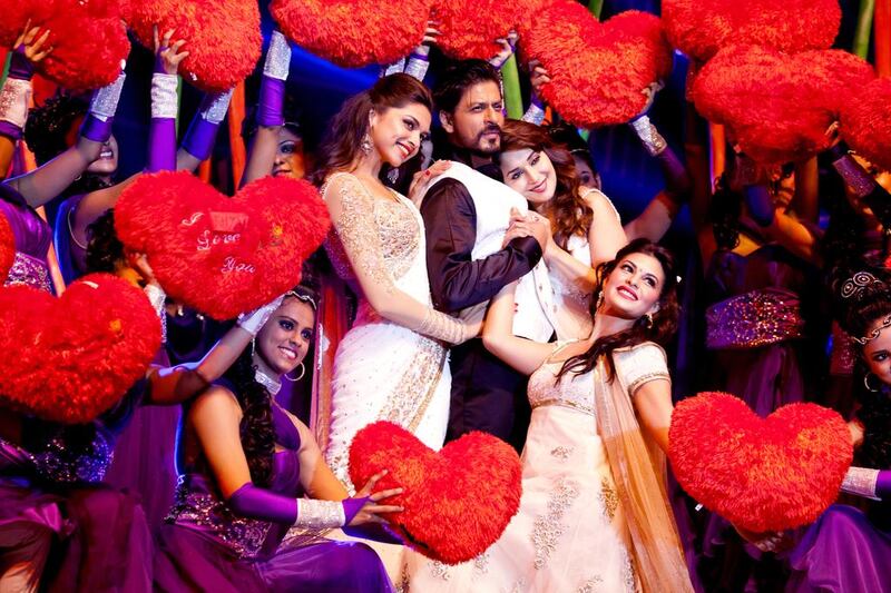 Shah Rukh Khan with Deepika Padukone, left, Madhuri Dixit, right and Jacqueline Fernandez, far right. Victoria Vinnikava for The National 